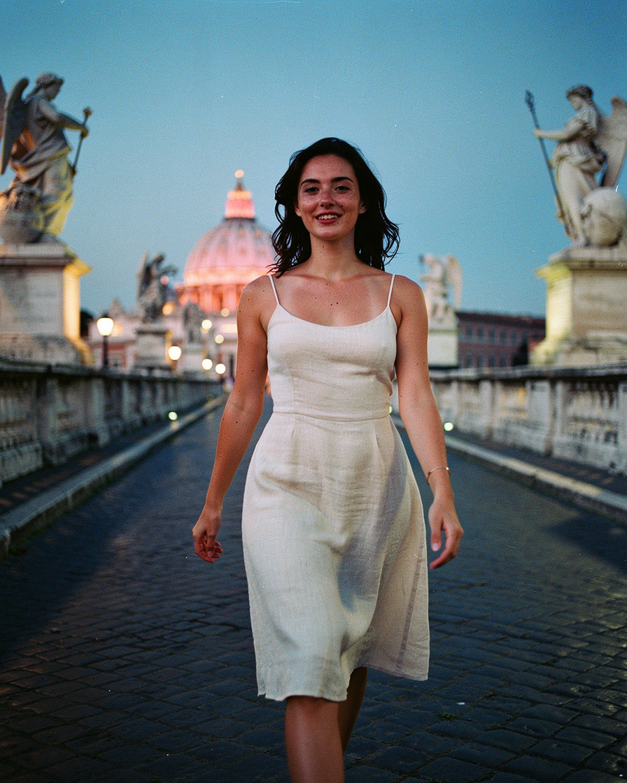ponte sant'angelo dusk rome: Baroque stone angel statue on Ponte Sant'Angelo in Rome at dusk, the dome of St Peter's Basilica